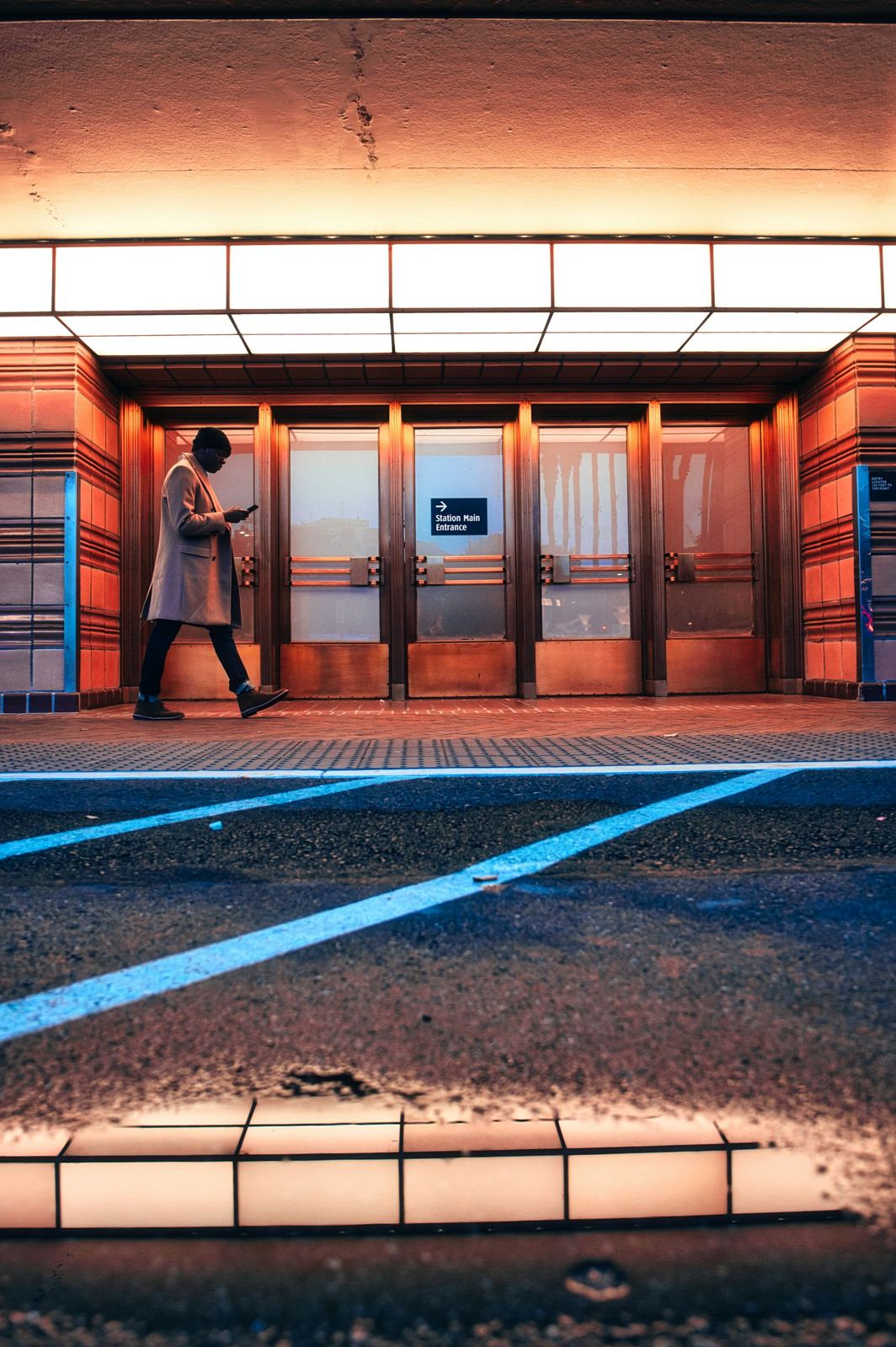 Sample photograph of a pedestrian against illuminated architecture
